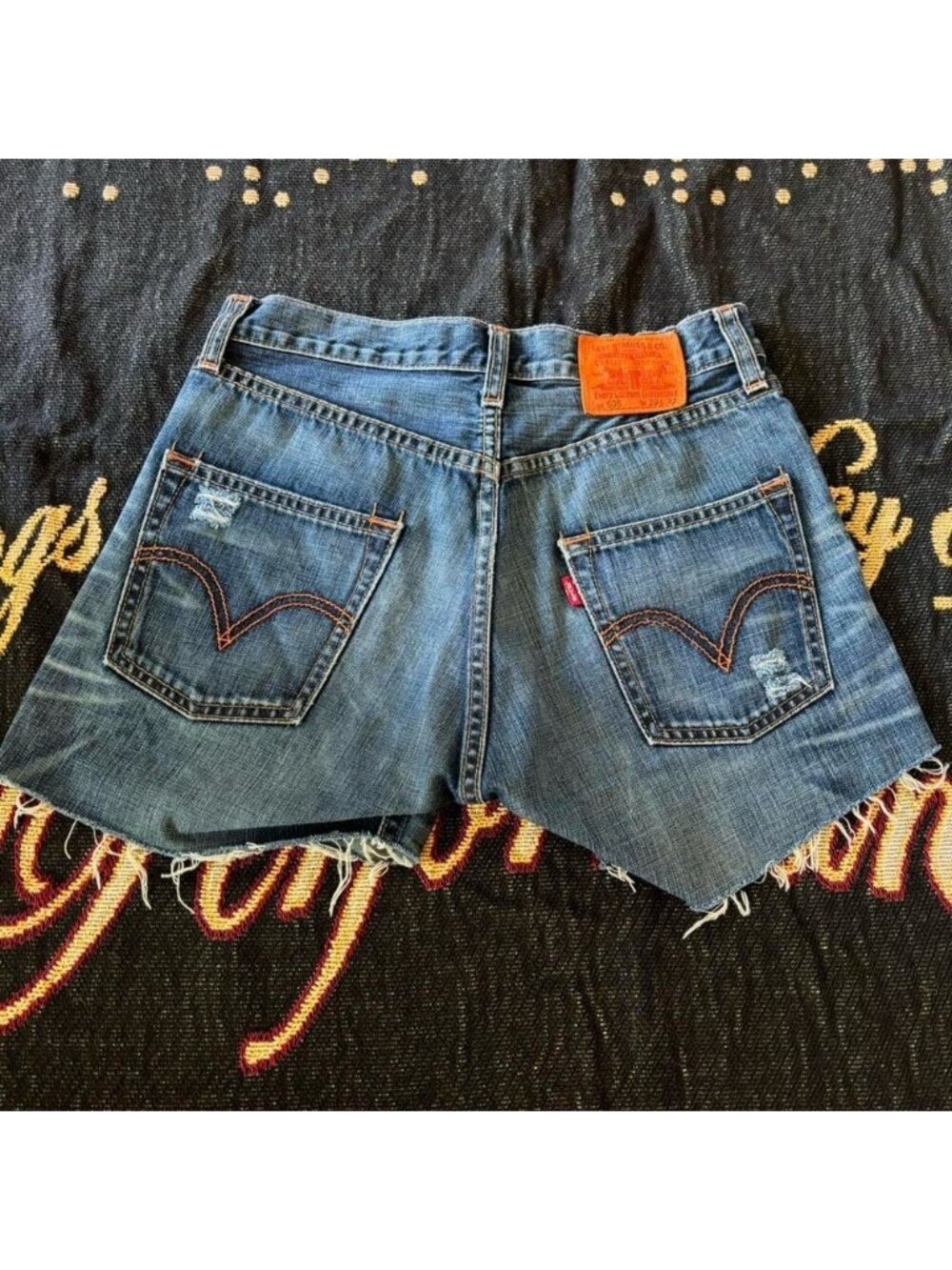 Levi's 501 distressed denim jean shorts orange tag